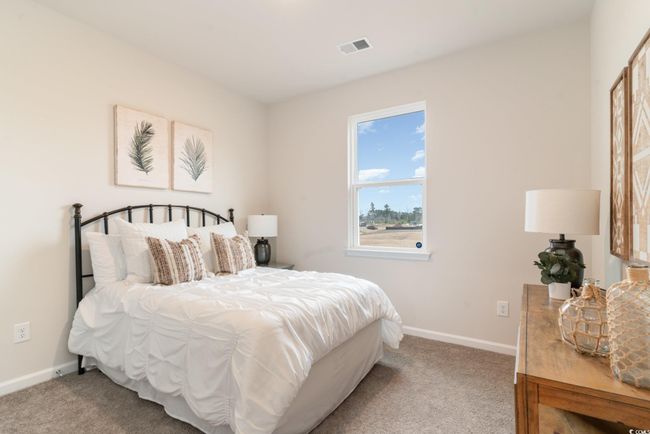 Carpeted bedroom featuring baseboards | Image 24