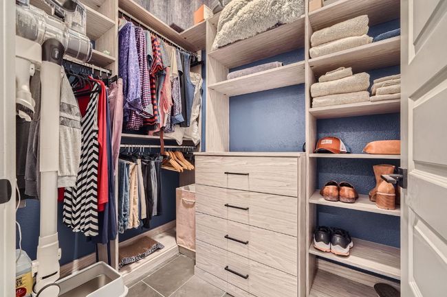 View of spacious closet | Image 17