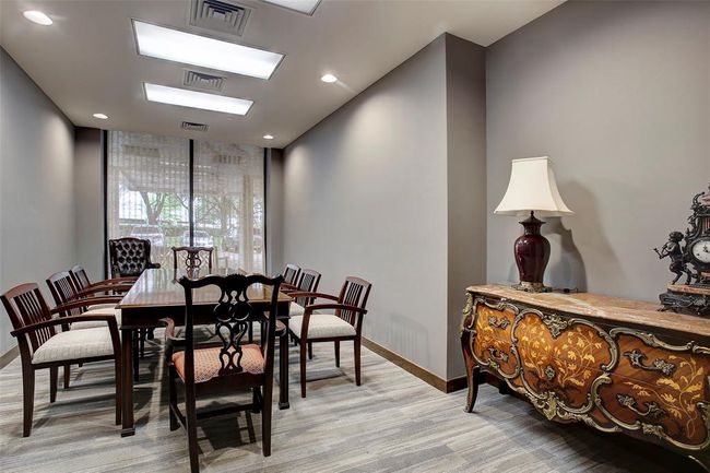 The boardroom provides a sophisticated setting, ideal for hosting meetings and gatherings within the building. | Image 32