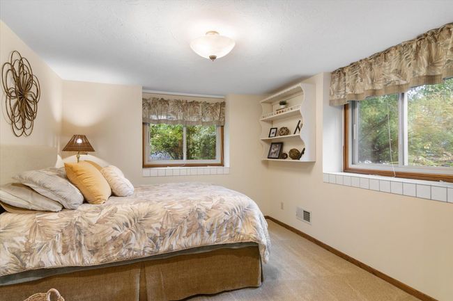 Fourth bedroom, located in the lower level | Image 27