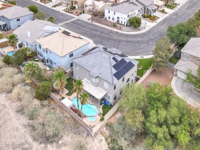 Aerial view of residential area with a pool | Image 48