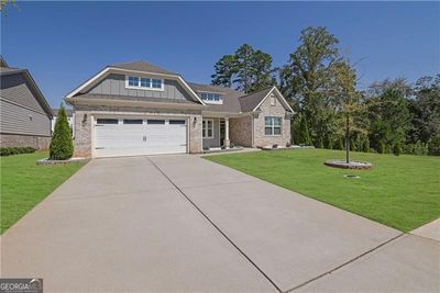 6748 Cambridge Drive, House other with 3 bedrooms, 2 bathrooms and 2 parking in Flowery Branch GA | Image 1