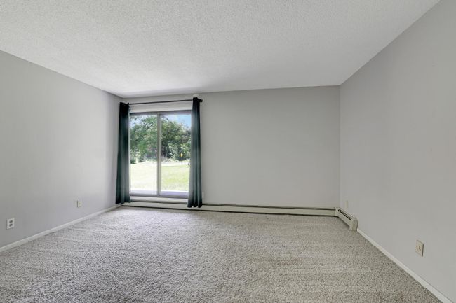Large bedroom with the same wonderful views. | Image 8