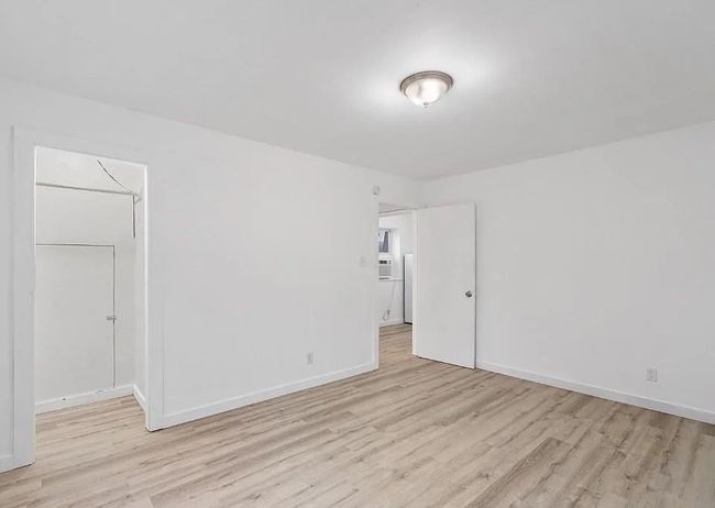 Spare room with light wood-style flooring | Image 20
