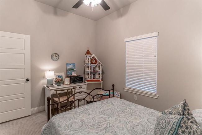 Laundry area with cabinets, sink, independent washer and dryer, and light tile floors | Image 24