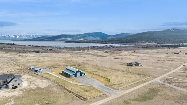 Bird's eye view with a water and mountain view and a rural view | Image 10
