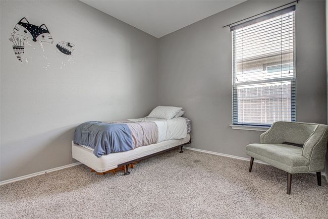 Bedroom featuring carpet floors and baseboards | Image 17