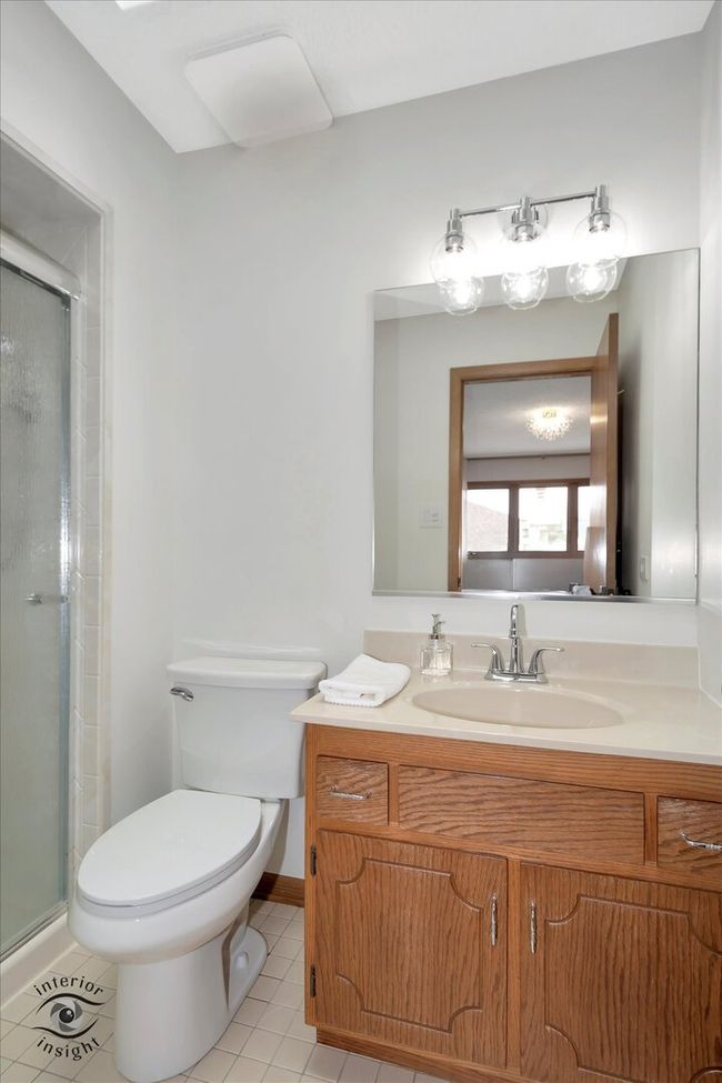 Confort height commode, updated faucet. | Image 13