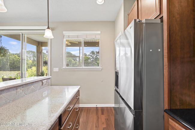 Kitchen window to patio | Image 17
