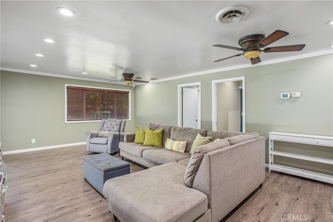 Extra-large family room, the doors are to the 2 bedrooms and bathrooms also off the family room | Image 19