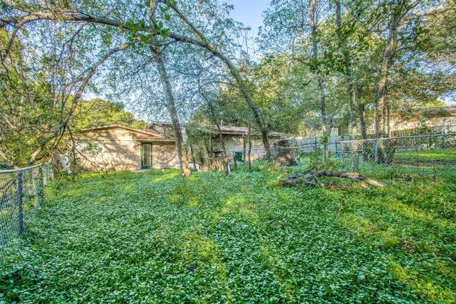 View of yard featuring a fenced backyard | Image 25