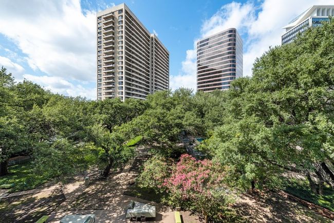 Sweeping view directly out the unit's balcony. | Image 14