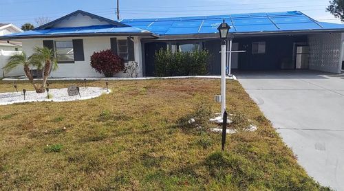 1205 Hacienda Dr, SUN CITY CENTER, FL, 33573-5525 | Card Image