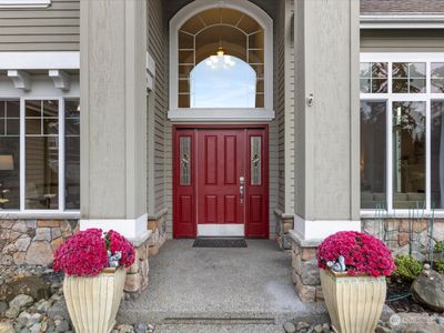 The home is beautiful inside and out, with gorgeous landscaping and two story entry. | Image 2