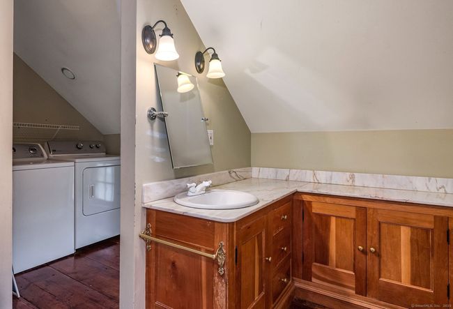 full bath with washer and dryer | Image 38