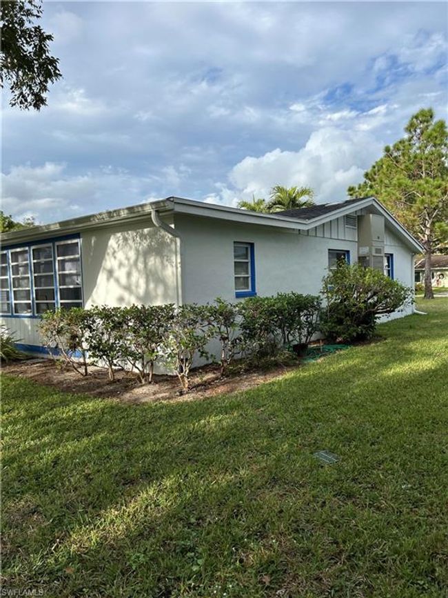 View of home's exterior featuring a yard | Image 19