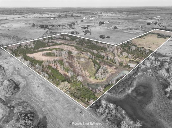 The large piece is the back of the property - the narrow section borders the road. | Image 7