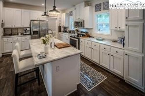 211 & 213 Wild Daisy Lane, Banner Elk, NC, 28604 | Card Image