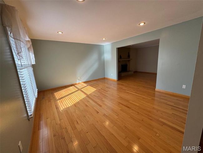 living room featuring light wood-type flooring | Image 14