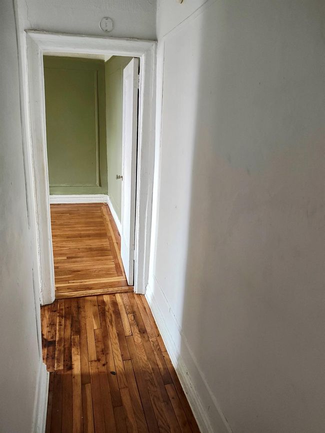 Hallway featuring hardwood / wood-style flooring | Image 14