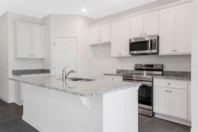 8928 Nuthatcher Dr, House other with 3 bedrooms, 2 bathrooms and null parking in LEESBURG FL | Image 22