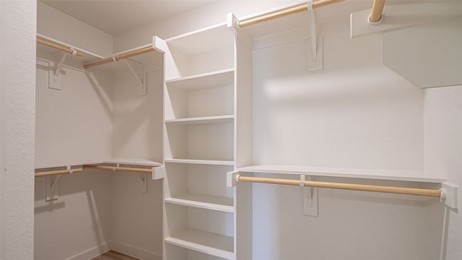 Primary closet with built in shelves | Image 22