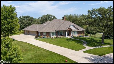 2504 Country Oaks Drive, Home with 3 bedrooms, 2 bathrooms and 3 parking in Atlantic IA | Image 1