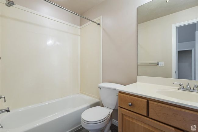 Full bath featuring bathing tub / shower combination and vanity | Image 31