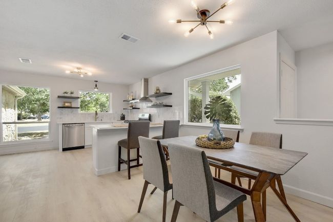 Extra seating is available at the kitchen counter! | Image 6
