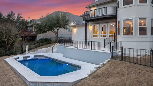 View of pool with a patio and a hot tub | Image 36