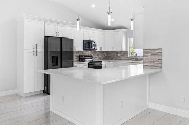 1317 Sw Paar Dr, House other with 4 bedrooms, 3 bathrooms and null parking in Port St. Lucie FL | Image 4