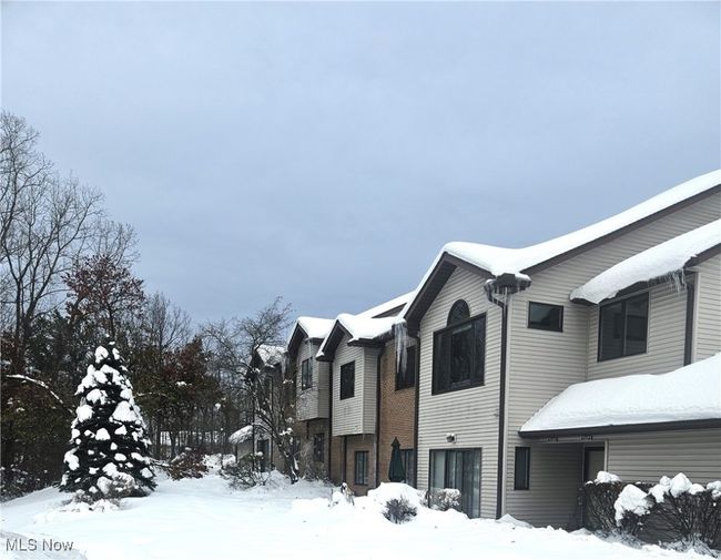 View of snow covered property | Image 21