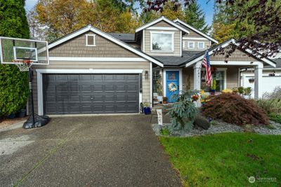 This 2-story home with an attached 2 car garage is spacious and inviting. | Image 1