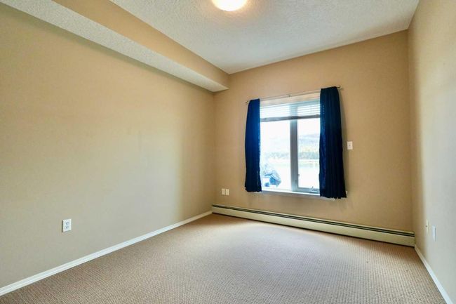 404 - 9810 94 St, Condo with 2 bedrooms, 2 bathrooms and 1 parking in Peace River AB | Image 21