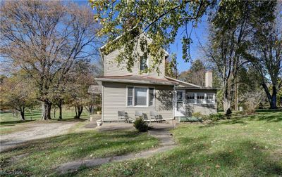 View of front of home with a patio and a front yard | Image 2