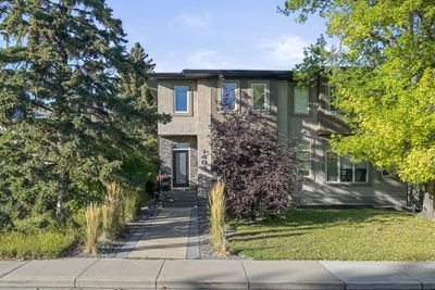 1404 21 Ave Nw, Home with 4 bedrooms, 3 bathrooms and 2 parking in Calgary AB | Image 1