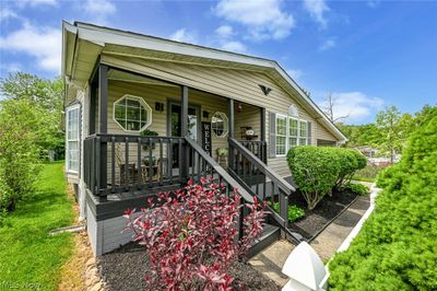 View of front of property featuring a porch | Image 1