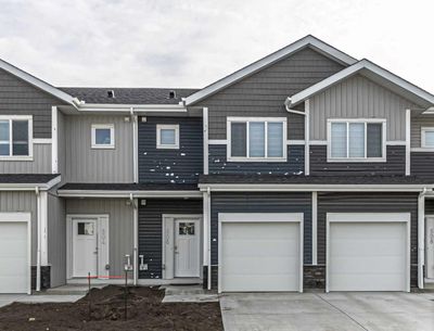 506 - 137 Red Embers Link Ne, Home with 4 bedrooms, 3 bathrooms and 2 parking in Calgary AB | Image 1