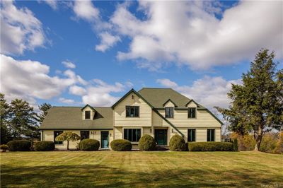 View of front of house featuring a front lawn | Image 1