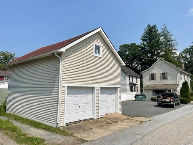 7 car outside parking , and 2 car garage with full loft, high ceilings. | Image 27