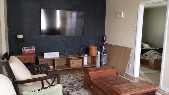 Living room featuring wood finished floors | Image 28