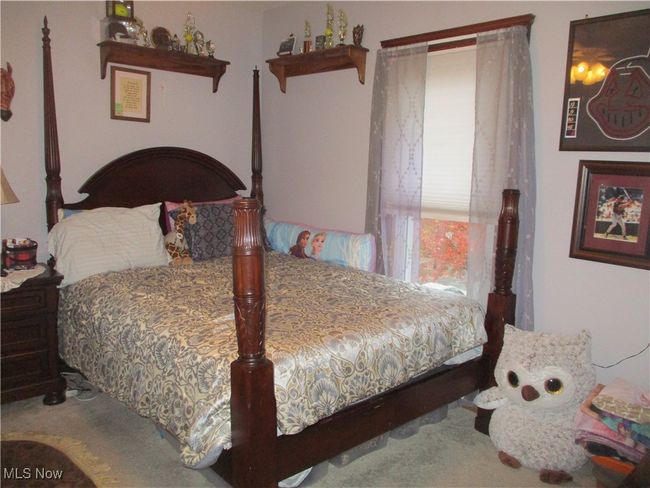 Bedroom featuring carpet | Image 24