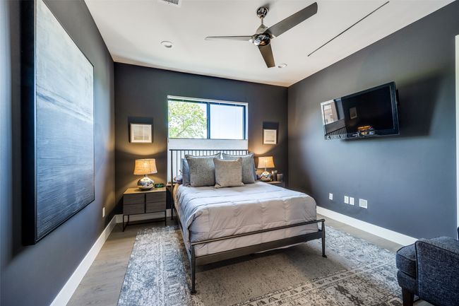 Bedroom with visible vents, a ceiling fan, and baseboards | Image 20