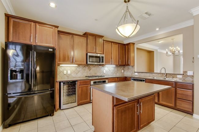 Large Kitchen with Refrigerator and Wine Cooler | Image 11