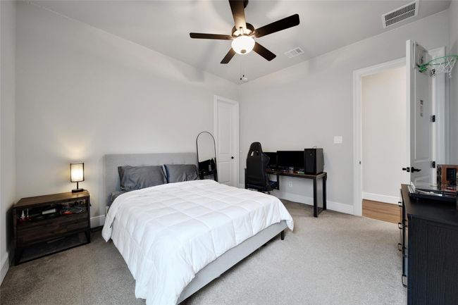 Another secondary bedroom with a full en suite bath. | Image 33