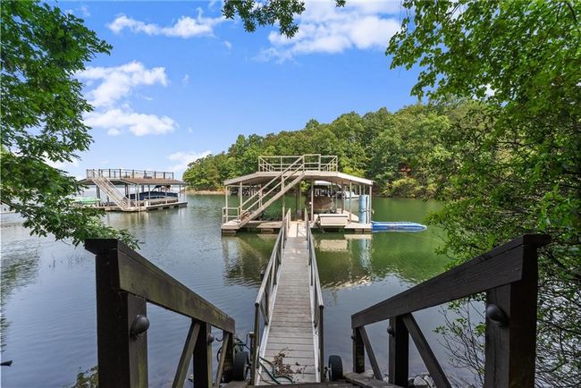 5610 Point West Dr, House other with 6 bedrooms, 7 bathrooms and null parking in Oakwood GA | Image 61