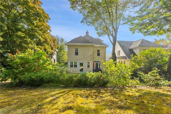 another view of the back of the home and the mature landscaping | Image 27