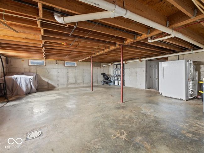 This is the first of the large basement rooms, currently where the laundry is located. | Image 34