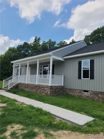 View of front of property featuring covered porch. This is not the actual home but same as one to be built | Image 1