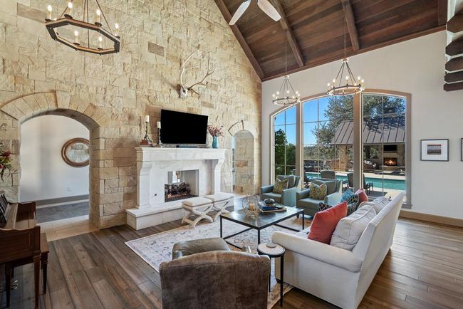 Great room with carved stone mantel | Image 10